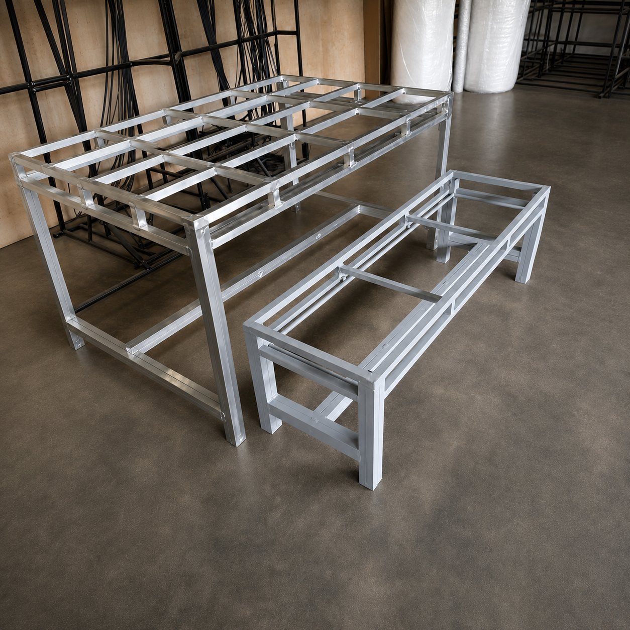 Welded aluminium table and bench frames ready for weaving